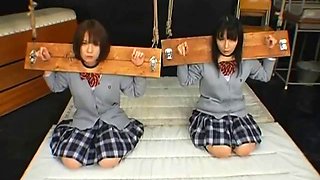 Two Asian schoolgirls are extremely dominated by group of men