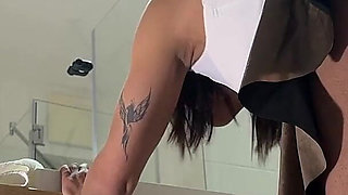 Miniskirt Lover Raver Girl Reveals Her Piercing on Her Pussy in the Bathroom by Lifting Her Short Skirt