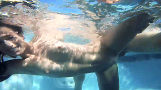 Slim mature mom enjoys underwater sex with her stepson