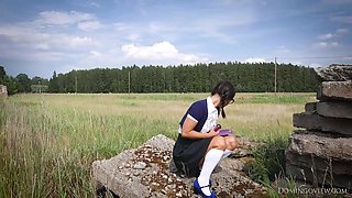 Pigtailed Young schoolgirl Outdoord with big pink dildo toy