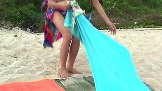 Cute girls love playing on the beach