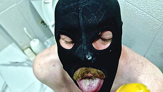 A slave is cleaning a dirty toilet when Dominatrix Nika comes to him with a strap-on and makes him take the strap-on in his mout