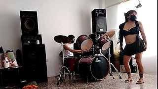 He Play the Drums for Her - She Dances, Stripping and Showing Her Ass
