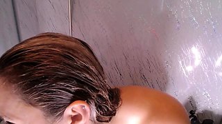 Big Boobed Blonde Masturbates With A Dildo In The Bathroom
