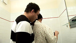 Horny wife gives footjob and gets fucked hard in bathroom - amateur mature brunette with huge tits