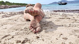 Covered in Sand and Above It All