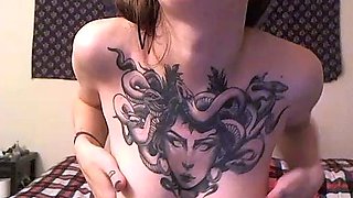 Busty curly brunette with big boobs fucks on couch