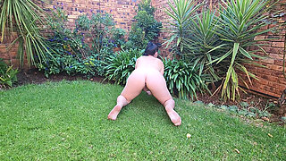 Naked small boobs big ass BBW pissing on a rose tree outside in the garden