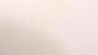A Married Woman Masturbates in the Bath