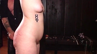 Tattooed Mature MILF Endures Strict Caning Discipline