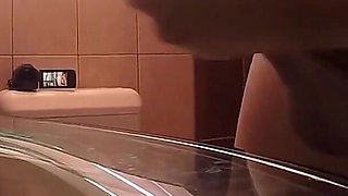 Handjob and Rimming in Hotel Toilet