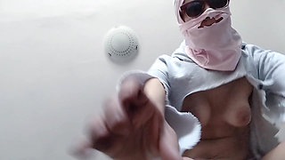 Amateur wife has fun trying on clothes and cutting them.