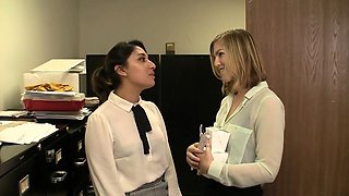 Nasty nymphomaniacs Nina and Ella expose their secret lust in an erotic office rendezvous