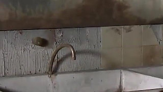 Riding his cock in a public restroom