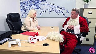 Lacey Starr gets her mature pussy eaten by a chubby Santa while getting her big tits fingered