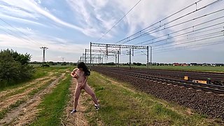 She massages her pussy all naked in public, even the train