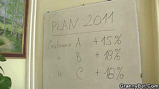 Busty mature lady boss takes it from behind