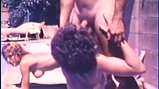 Outdoor interracial orgy fuck by the swimming pool