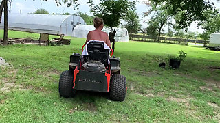 Titties out Riding lawnmower outdoors