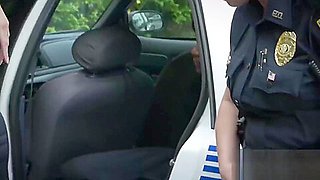 Milf cops subdue criminal against the car hood into stripping clothes off