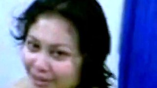 Shy Malaysian MILF Strips for the Camera