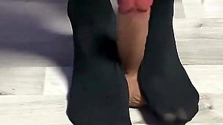 Sexy Dominatrix in Nylon Pantyhose Is Trampling Your Cock