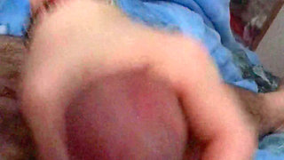 My wife gives me a gorgeous night handjob with a copious cum blast