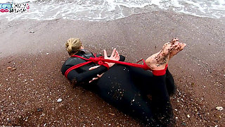 Hogtied in a Wetsuit - Rope Bondage Escape Challenge on the Beach