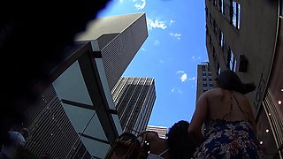 Sultry amateur girl with a sublime ass upskirt on the street