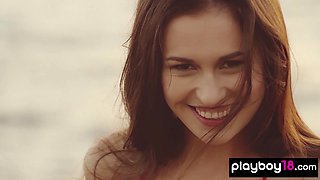 Naked babe shows off her playful side