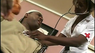 Lusty chocolate skin nurse heals patient's cock with her mouth