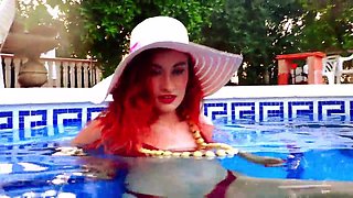 Ariel Ortiz likes to swim in the pool, while her neighbor sees her wank. She is a stunning sandy-haired, who likes to be observed in the pool