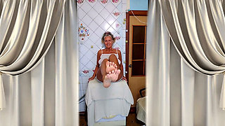Cheerful housewife Lukerya in the kitchen