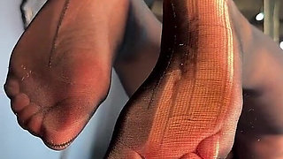 Watch Me Tease You with My Ripped Nylon Feet Through the Glass