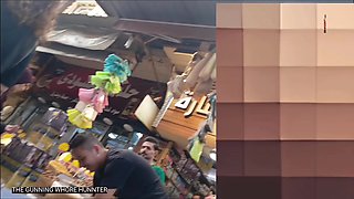 Ass young Arab woman with curly hair and olive jeans