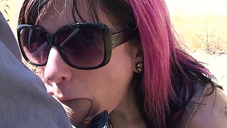 Punky babe with tattoos gives James a wild POV BJ under the sun