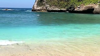 Walking with hot cum on my face on a public beach full of