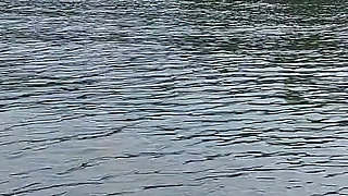 Sexy Granny Swims Naked in a Lake!