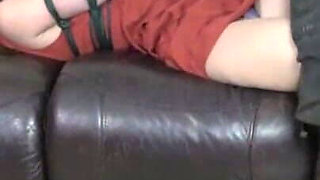 Boots, bondage and ball gag struggle