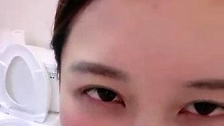 Asian babe sucking and jerking two hard dicks