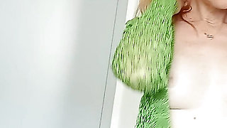 In green cardigan with chunky knits