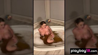 Sexy MILF taking a bath and masturbating