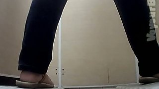 Pale skin booty of a stranger lady in jeans filmed nude in the toilet